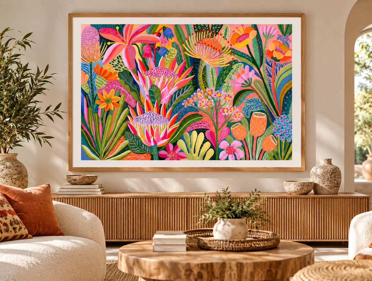 Colourful Australian floral wall art print featuring pink proteas, orange native-inspired flowers, bright botanical patterns and lush green foliage.