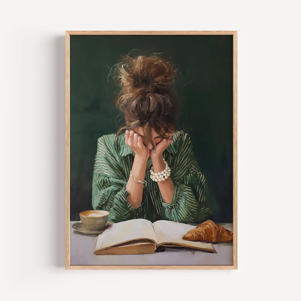 emerald green wall art print of woman reading with coffee and croissant