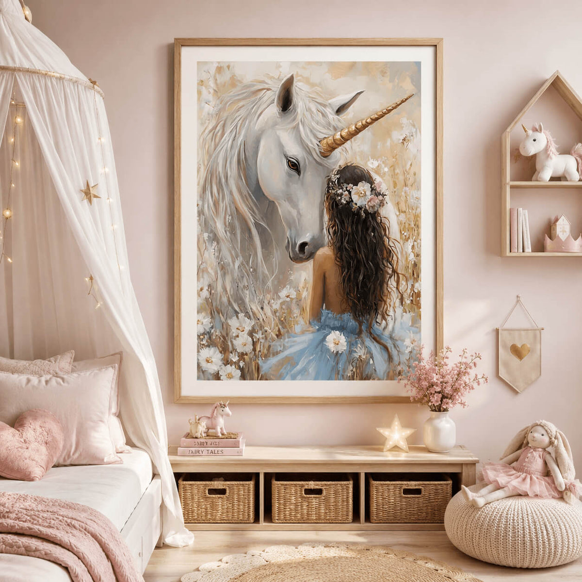 Girl and unicorn wall art print displayed in a large timber frame in a soft pink girls bedroom with whimsical nursery decor.