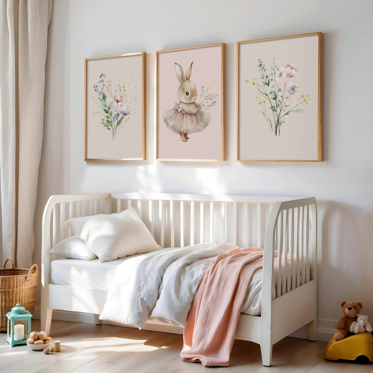 Set of 3 printed Nursery wall art prints that come in standard International sizes. Side prints  are Beige and a centre pastel pink print. Illustrations are   wildflowers and  a bunny in a tutu holding a posy of wildflowers. Printed on 250 gsm paper.