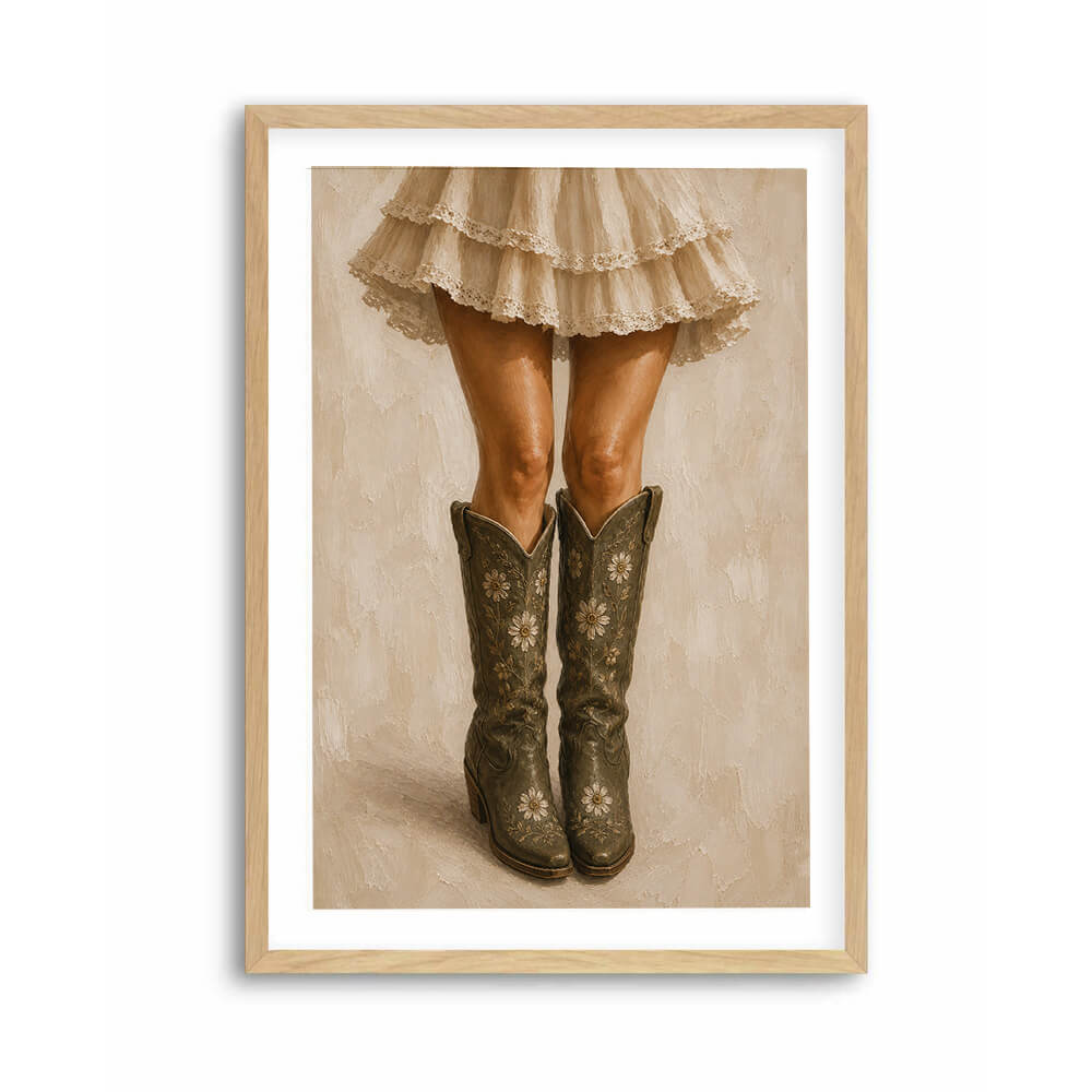 Floral Cowgirl Boots Wall Art displayed in a neutral bedroom with sage green bedding and oak frame