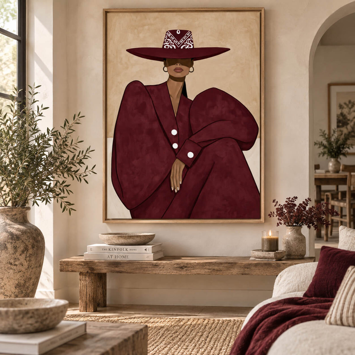Burgundy Western fashion wall art in a warm neutral bedroom with wine coloured accents