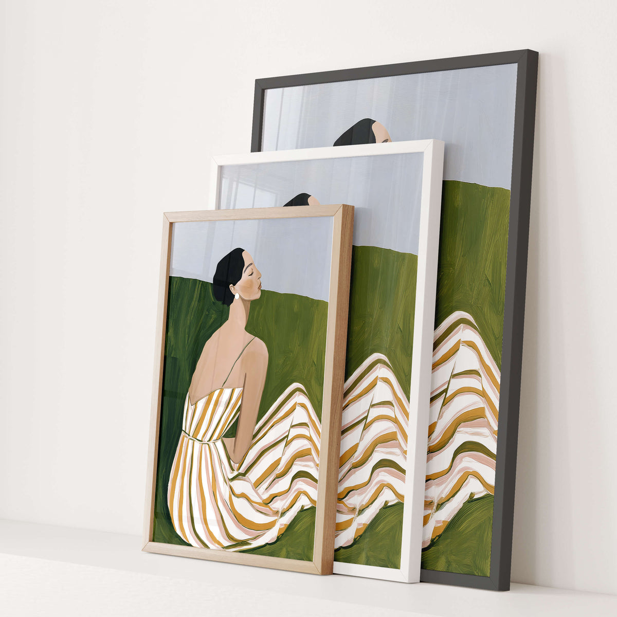 Contemporary wall art print of a seated woman in a striped summer dress displayed as a stacked set of frames, adding style to bedrooms or living spaces.
