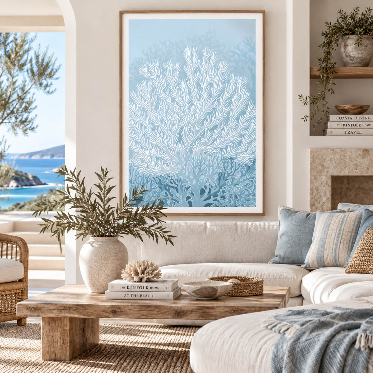 Blue coral wall art featuring delicate white sea coral on a soft coastal blue background