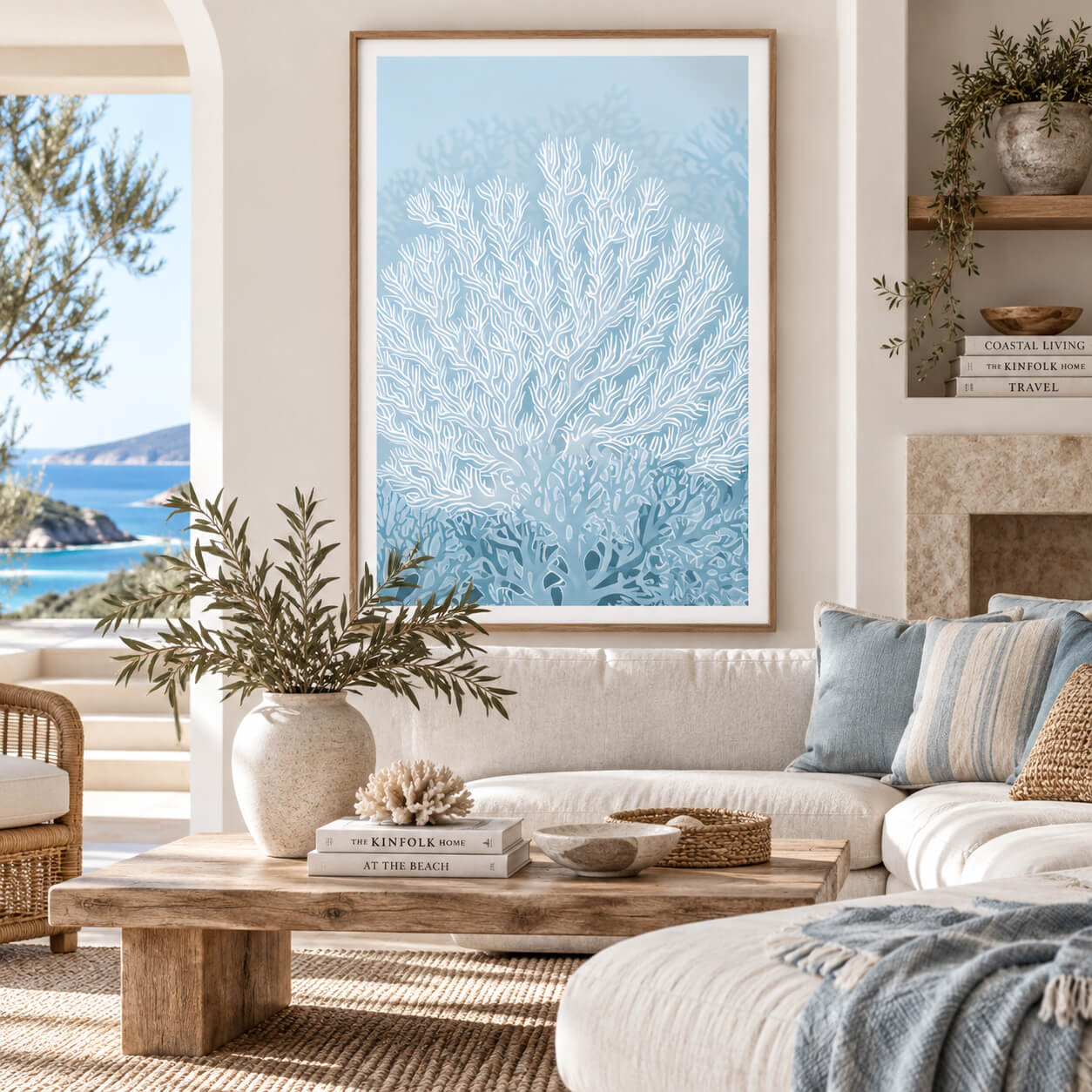 Blue coral wall art featuring delicate white sea coral on a soft coastal blue background