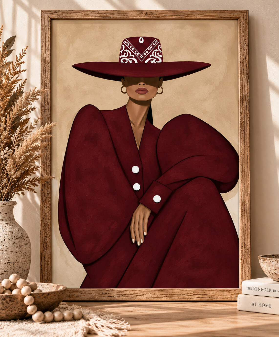 Burgundy cowgirl wall art featuring a stylish woman in an oversized Western hat