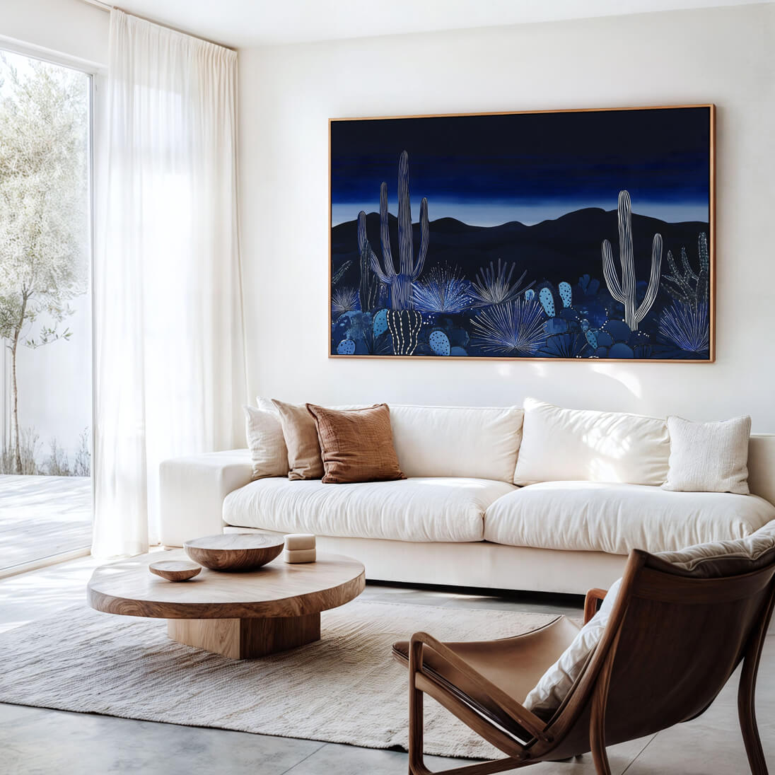 Horizontal southwestern cactus wall art in deep indigo and midnight blue tones, showcasing a serene desert scene with modern botanical styling for coastal and modern interiors.