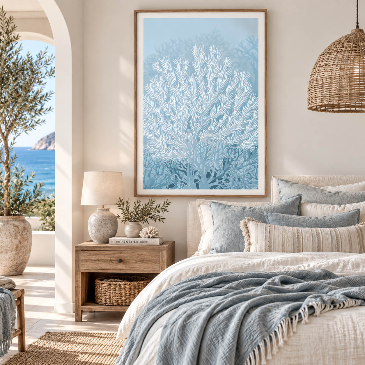 Blue coral wall art featuring delicate white sea coral on a soft coastal blue background