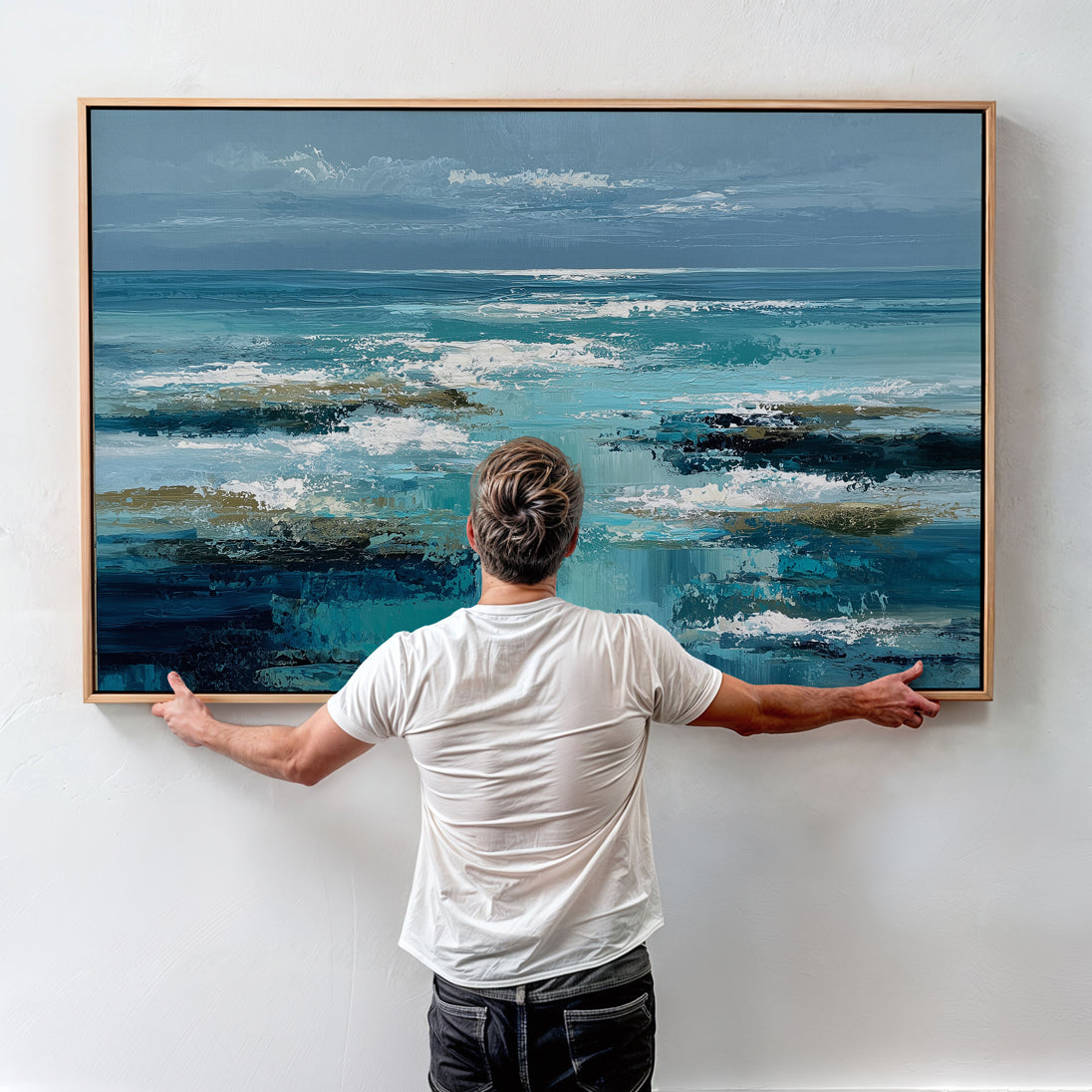 Abstract coastal wall art featuring textured blue ocean waves in a modern painterly style, available as a premium  framed canvas.