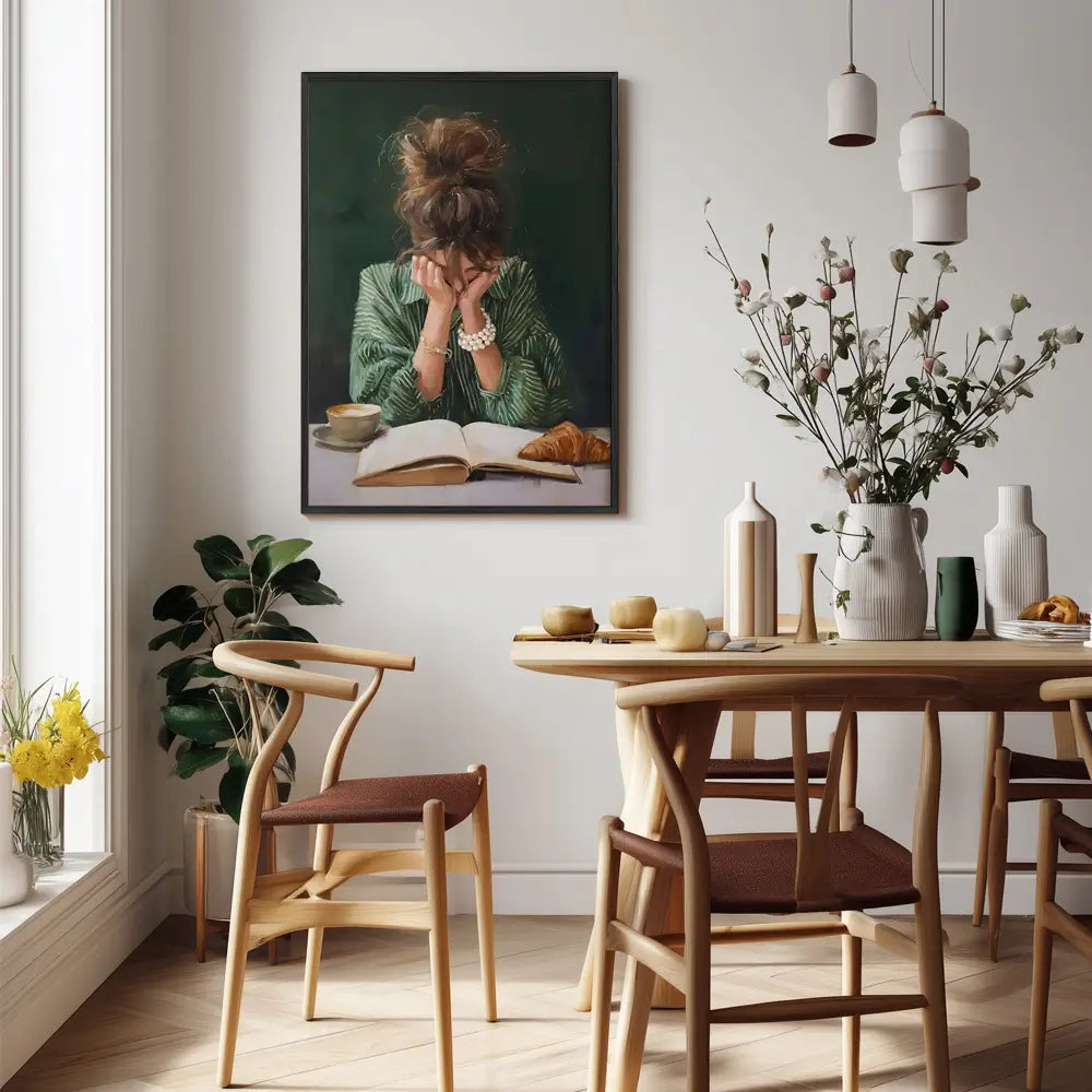 emerald green wall art print of woman reading with coffee and croissant