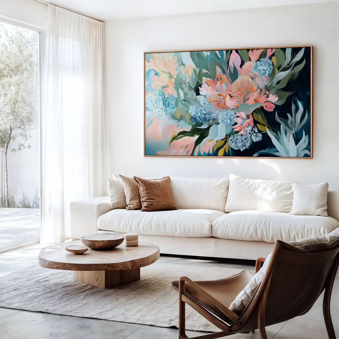 Botanical canvas artwork with soft pastel florals in natural white or black floating frame