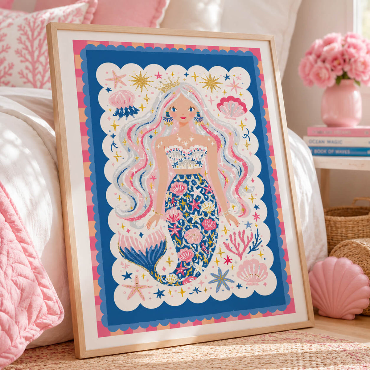 Colourful mermaid wall art for a girls bedroom featuring pink and blue seashells, starfish, coral and whimsical ocean details.