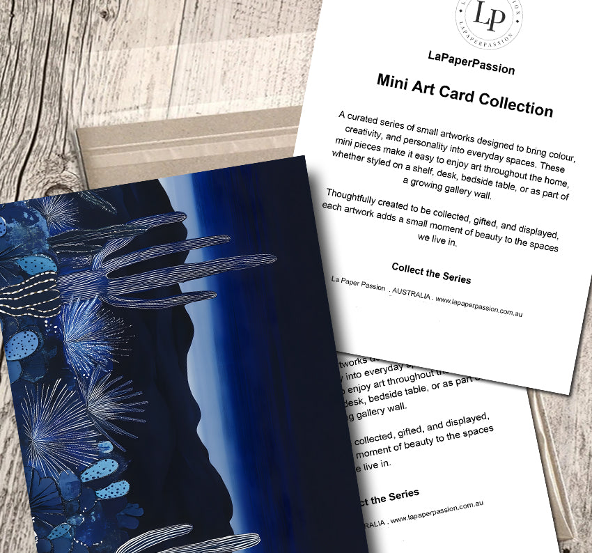 Moody desert landscape wall art with dark blue evening tones