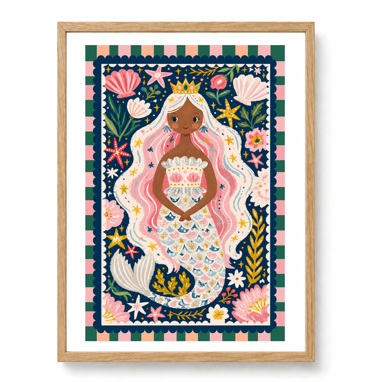 Colourful mermaid princess wall art in pink, navy and green with seashells, starfish and whimsical ocean details for a girls bedroom.