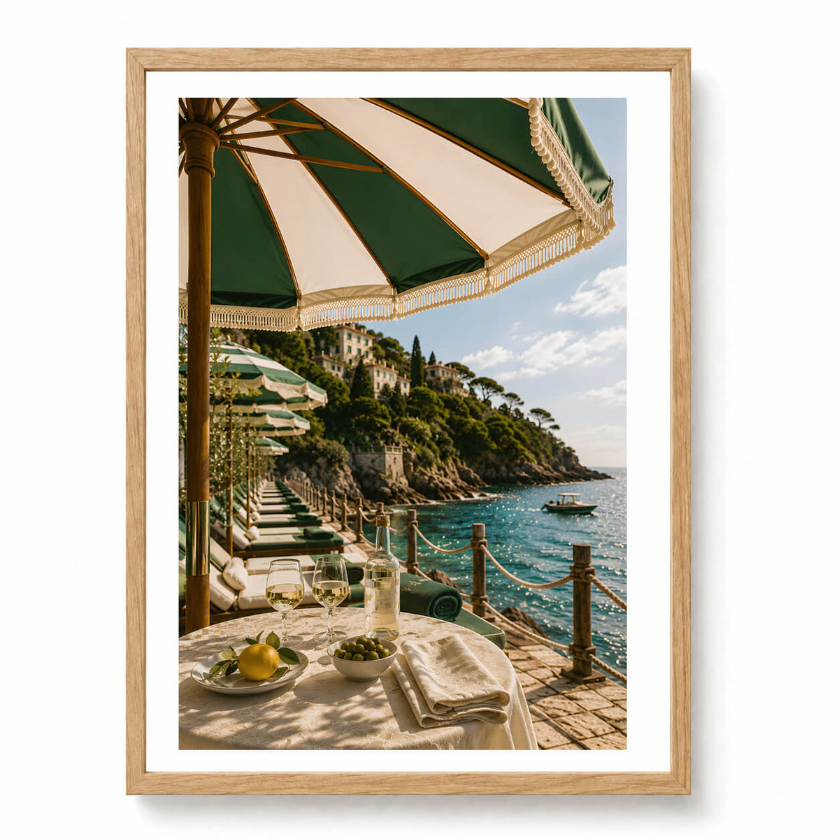 emerald green striped umbrellas, sparkling turquoise water, sun loungers, a waterfront table set with wine 