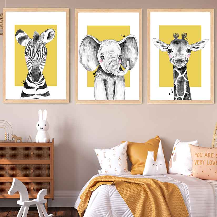 Zebra elephant and giraffe sketched wall prints with mustard yellow background